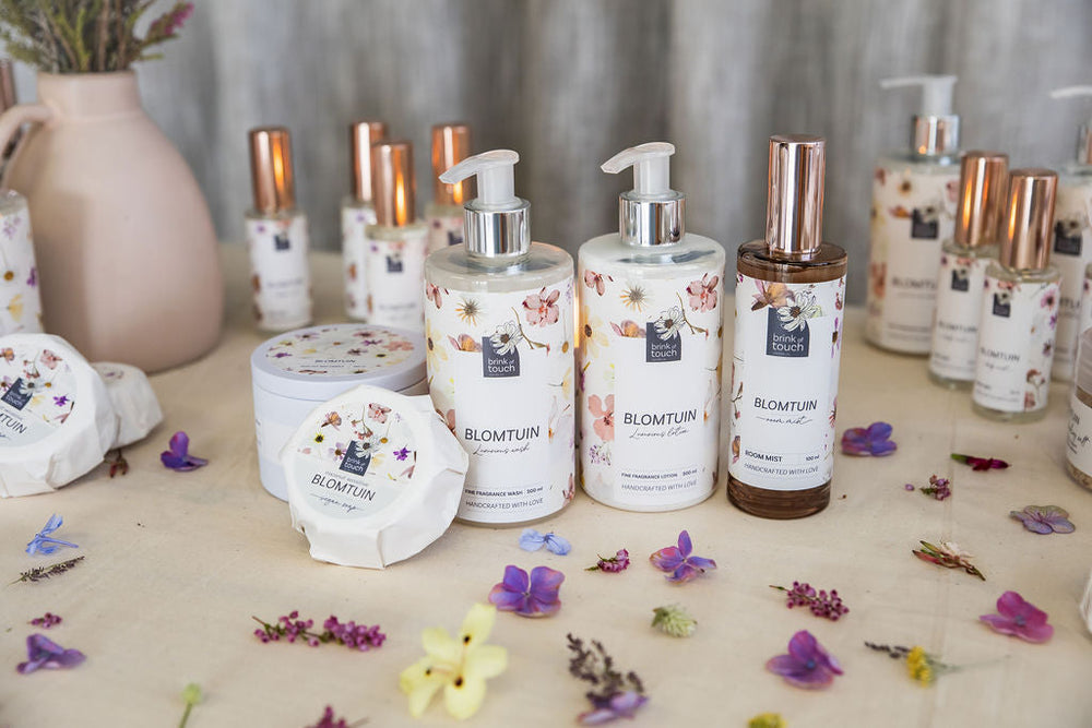 Blomtuin body range flat-lay, handmade body care from Bloemfontein, South Africa