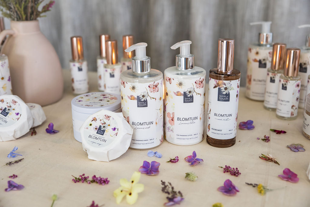 Blomtuin body range flat-lay, handmade body care from Bloemfontein, South Africa