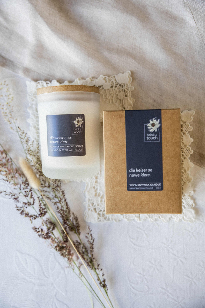 Afrikaanse Kers | Die Keiser Se Nuwe Klere candle by Brink of Touch
