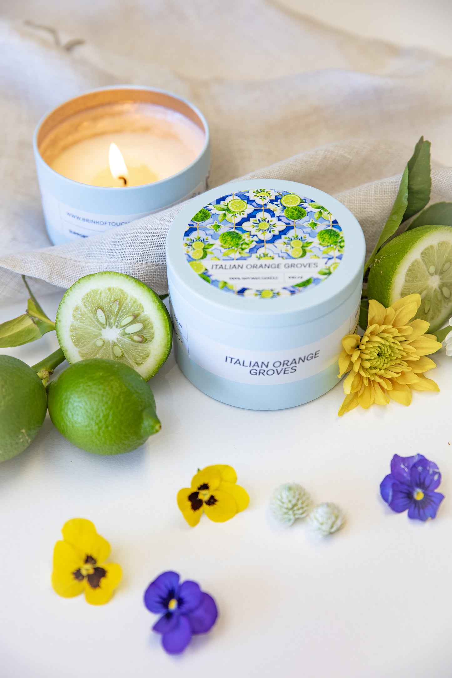 Italian Orange Groves tin candle, styled arrangement