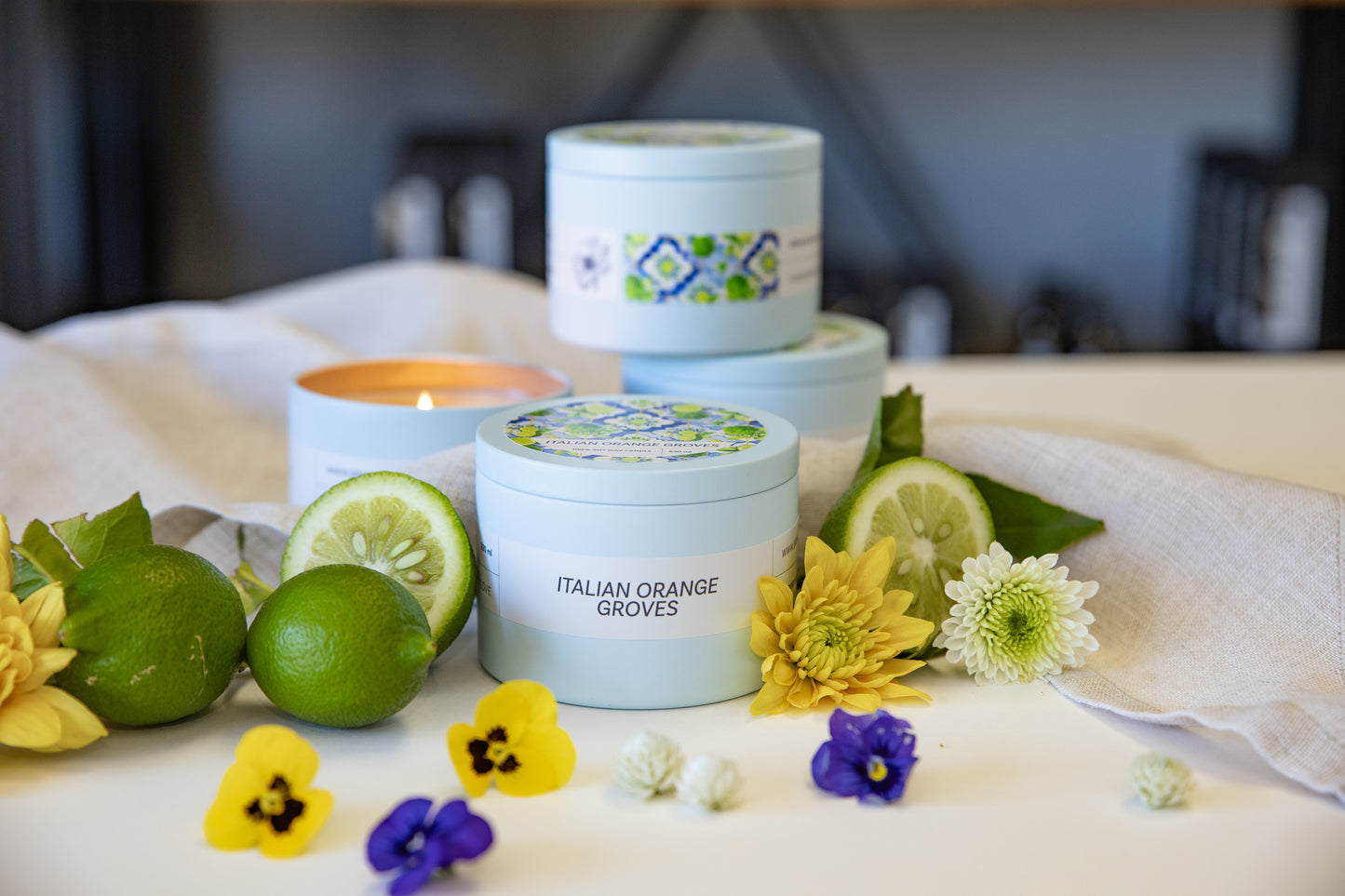 Italian Orange Groves tin candle, lifestyle shot