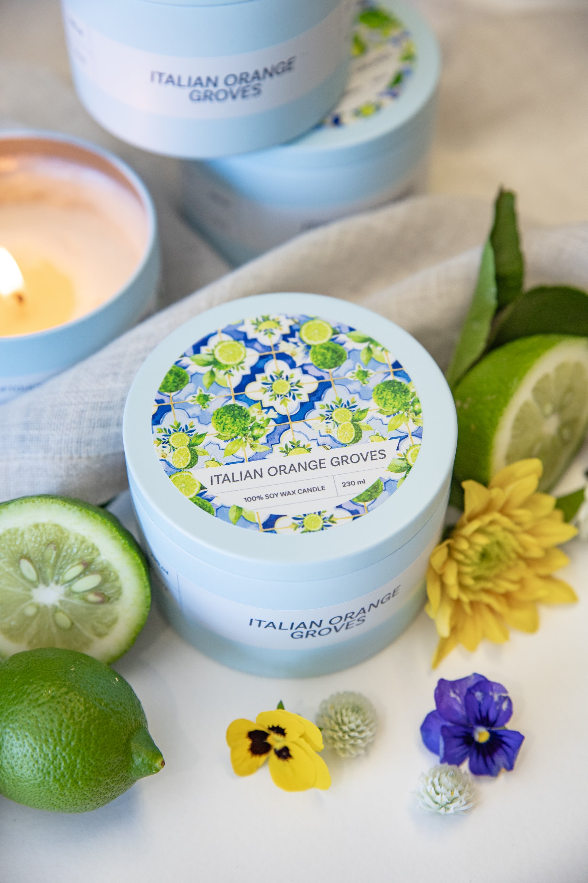 Italian Orange Groves tin candle, flat lay