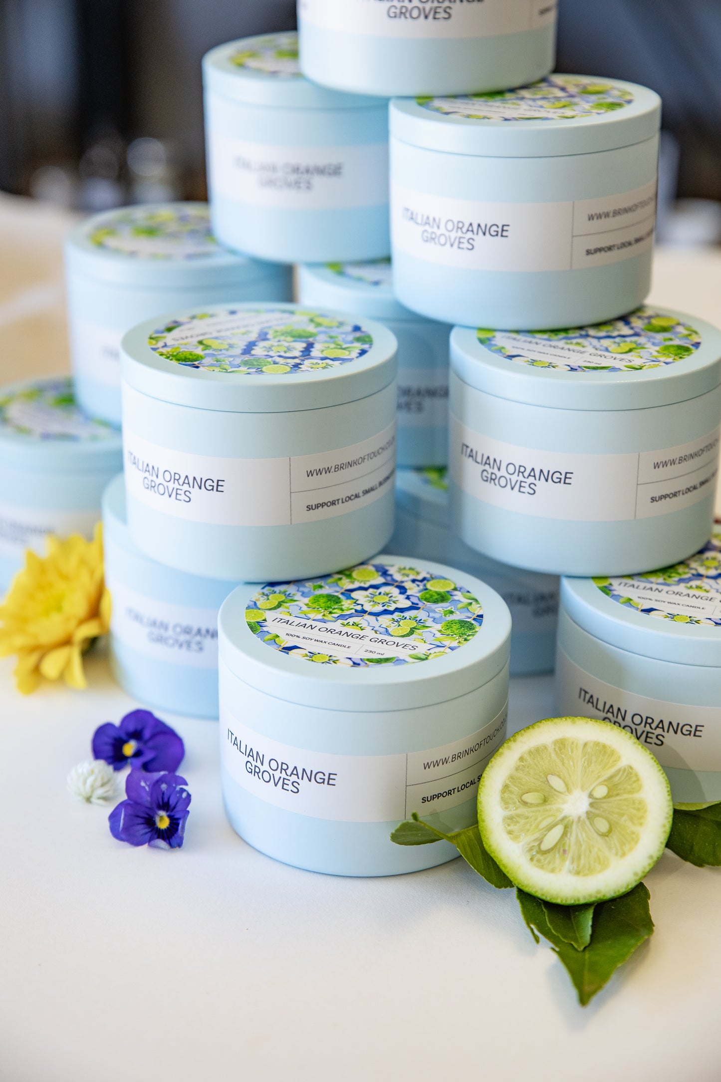 Italian Orange Groves candle tin with lid off showing soy wax