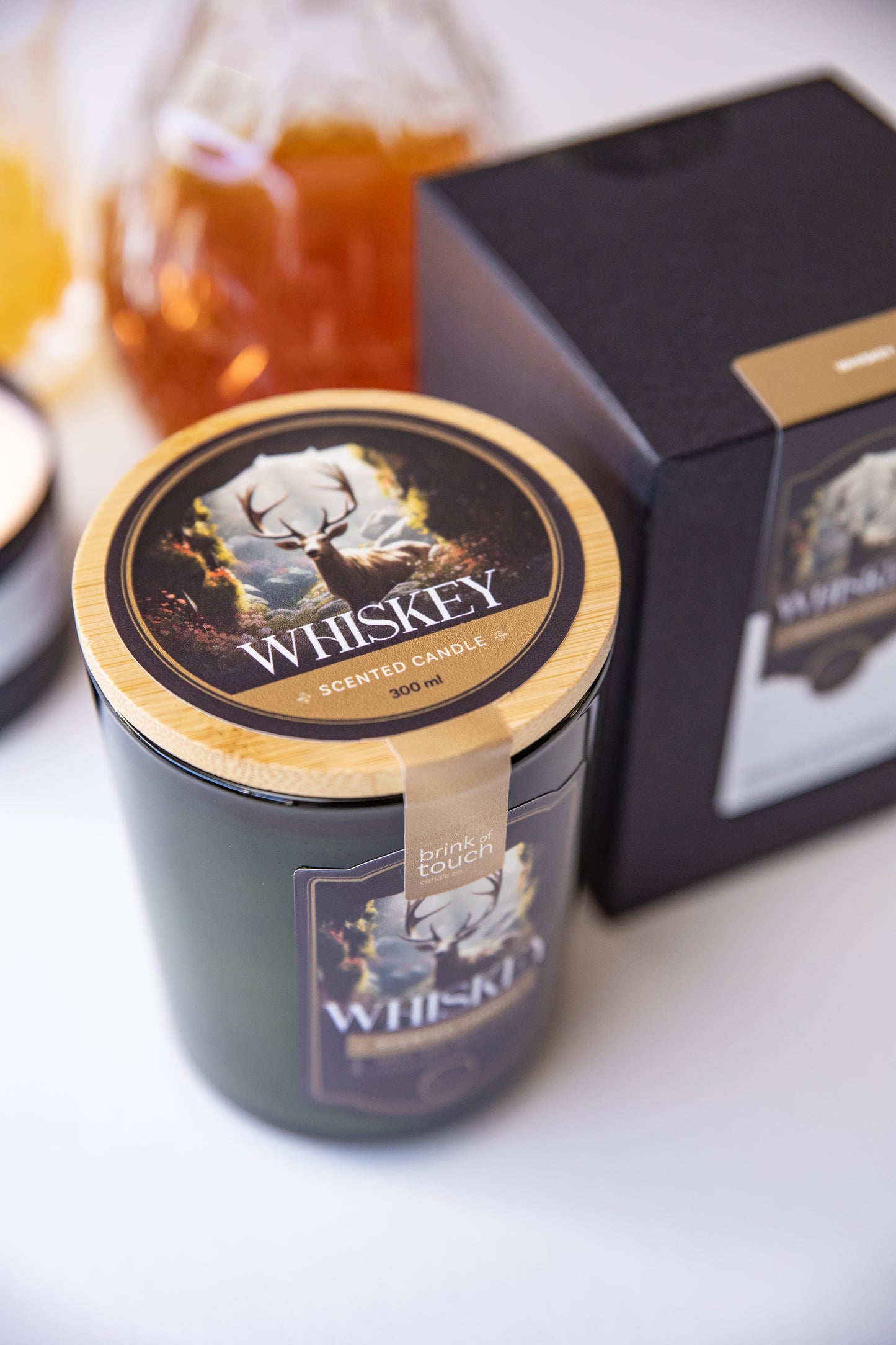 Whiskey scented soy wax candle by Brink of Touch, front view