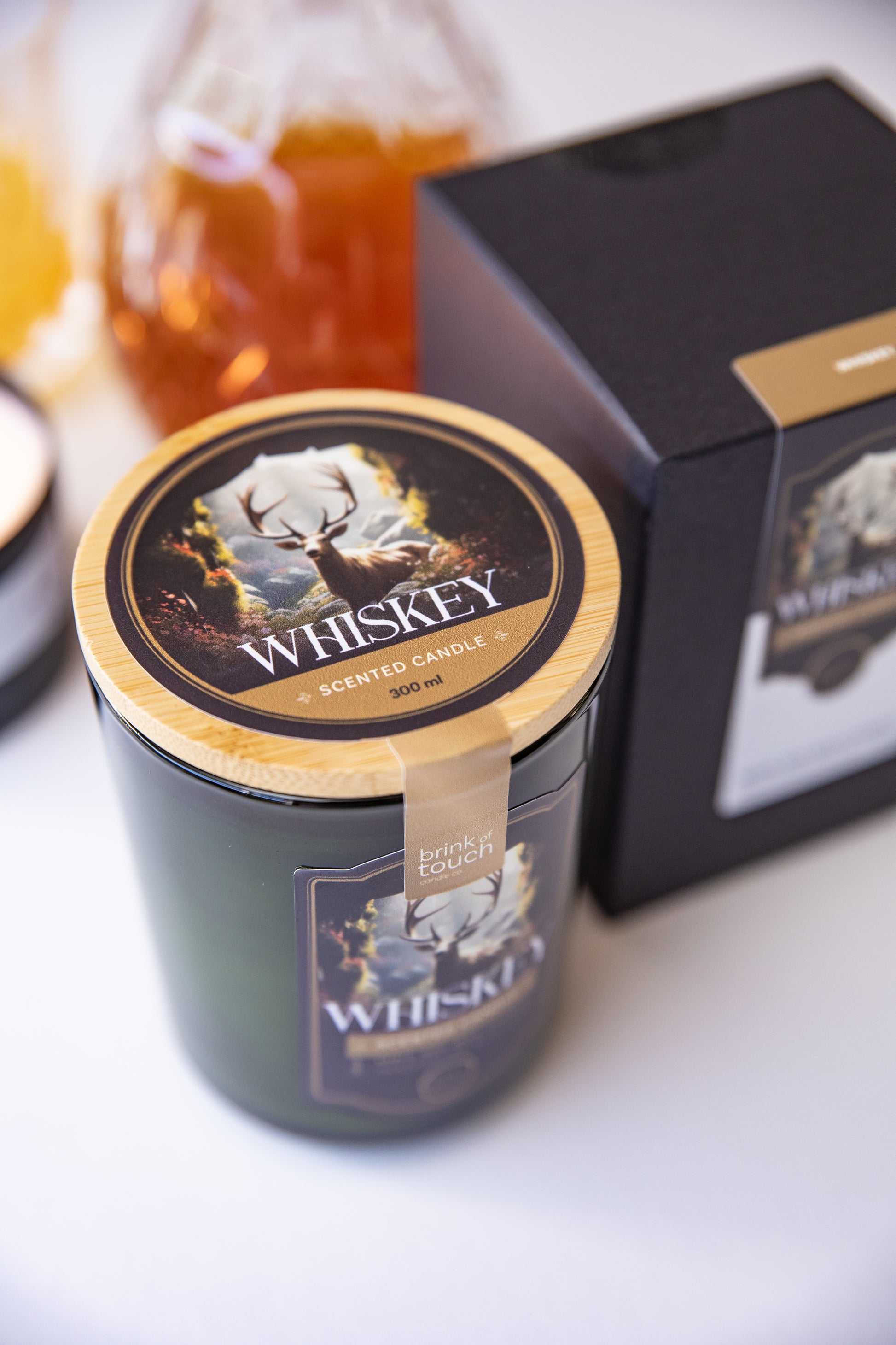 Whiskey scented soy wax candle by Brink of Touch, front view