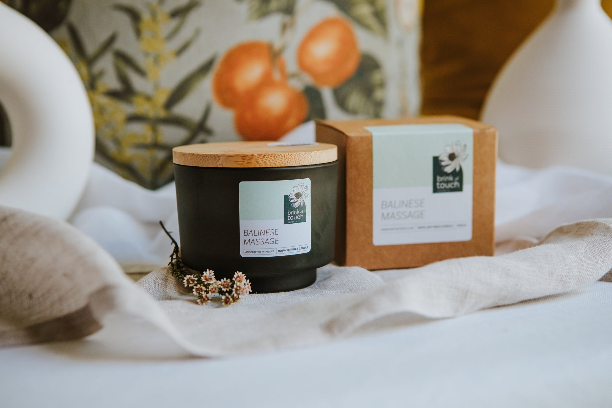 Balinese massage candle. A wild tropical blend of fruit, white florals, spice and a hint of musk. a milky bath drawn in a cast iron clawfoot bathtub. a true immersion in the decadence that is a massage on a tropical island.