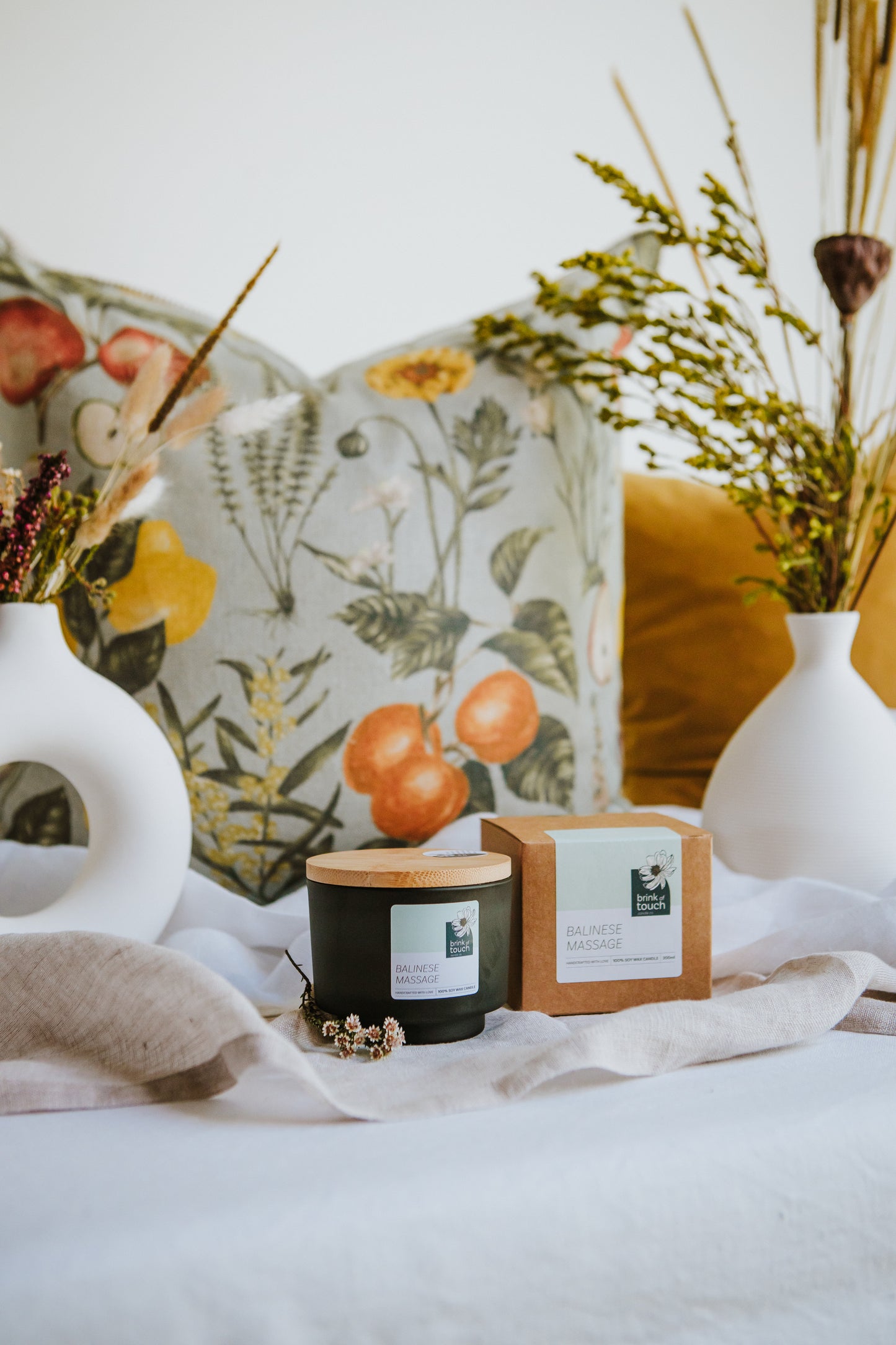 balinese massage candle. A wild tropical blend of fruit, white florals, spice and a hint of musk. a milky bath drawn in a cast iron clawfoot bathtub. a true immersion in the decadence that is a massage on a tropical island.