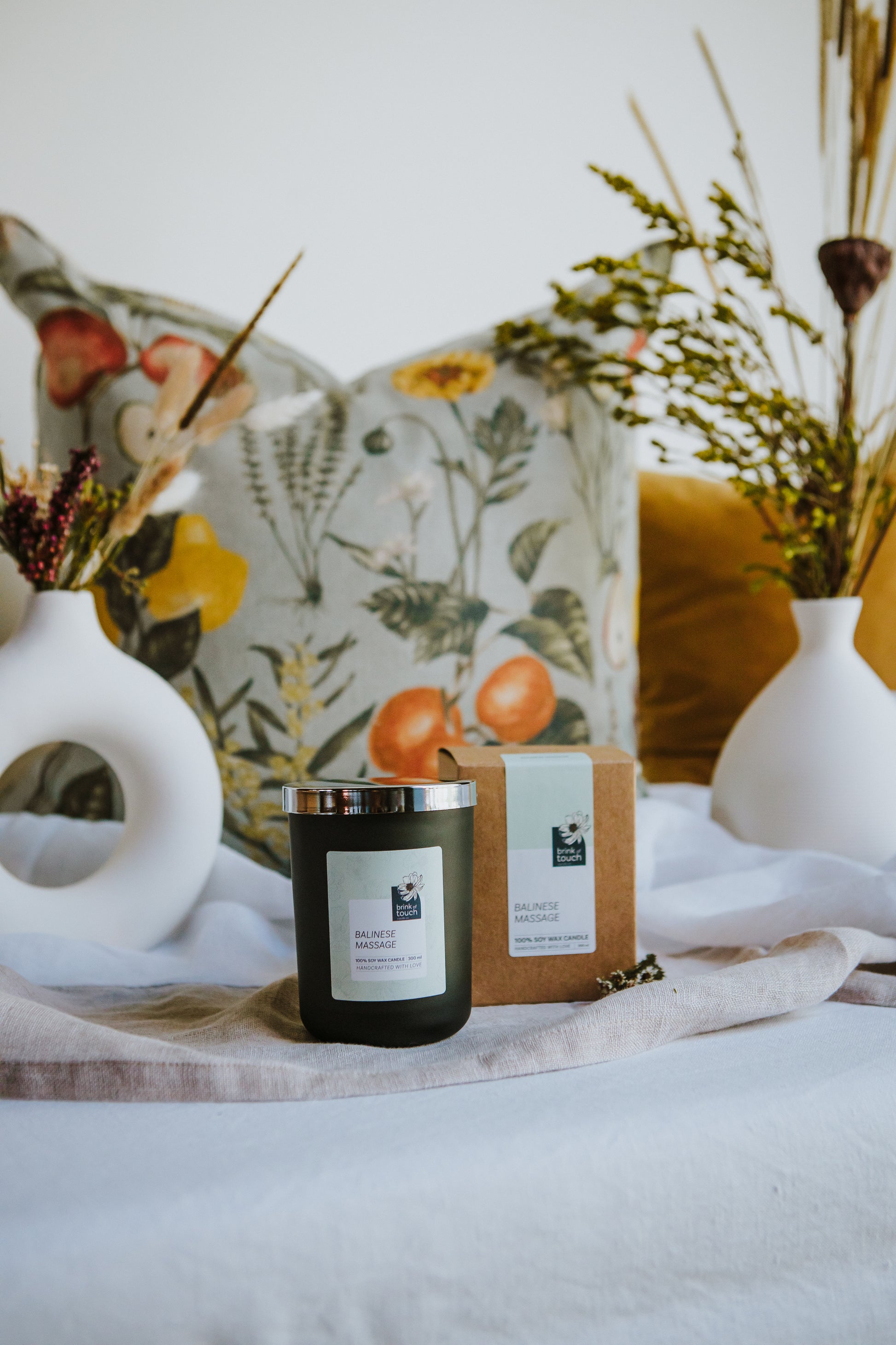 balinese massage candle. A wild tropical blend of fruit, white florals, spice and a hint of musk. a milky bath drawn in a cast iron clawfoot bathtub. a true immersion in the decadence that is a massage on a tropical island.