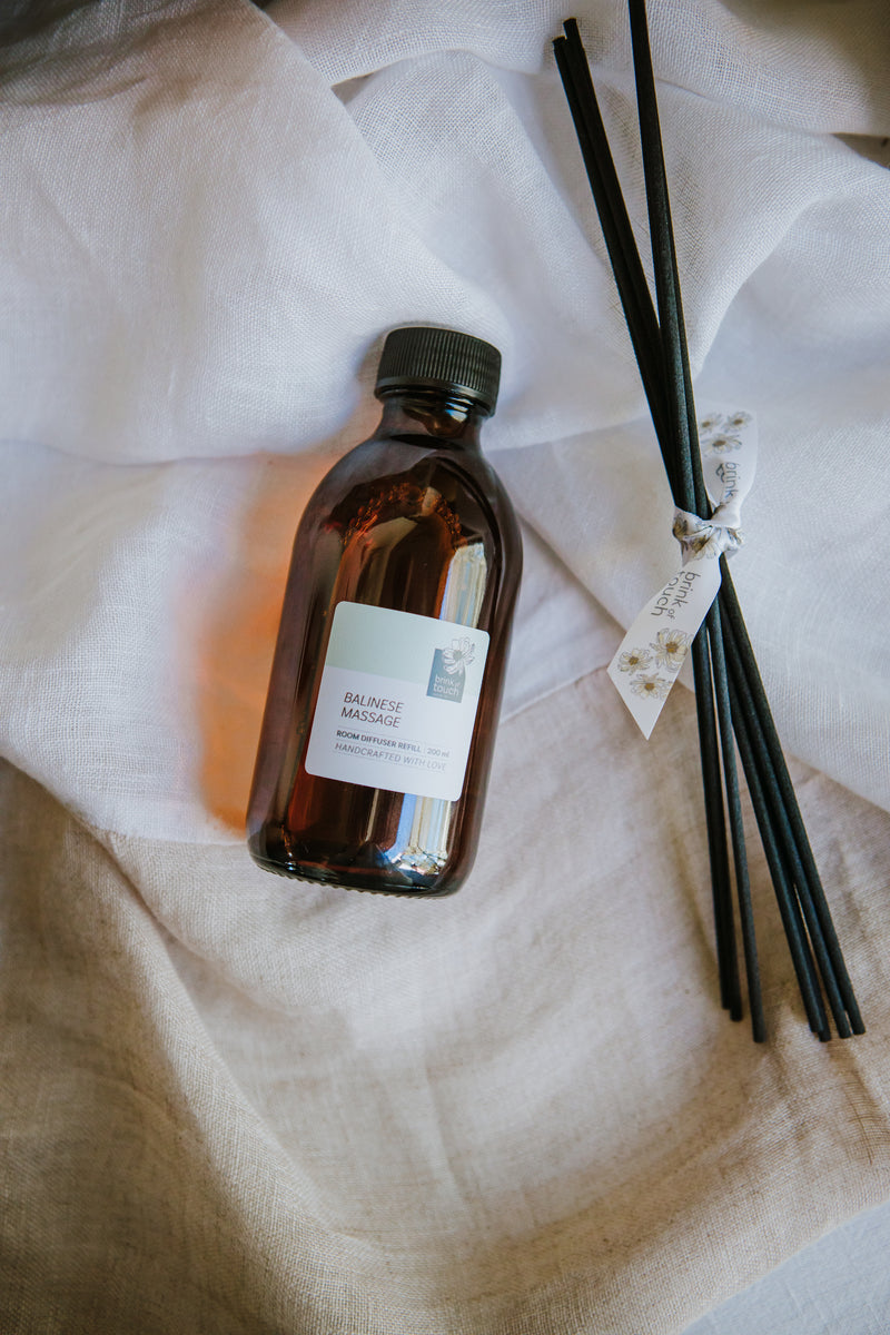 balinese massage diffuser (refill). A wild tropical blend of fruit, white florals, spice and a hint of musk. a milky bath drawn in a cast iron clawfoot bathtub. a true immersion in the decadence that is a massage on a tropical island.