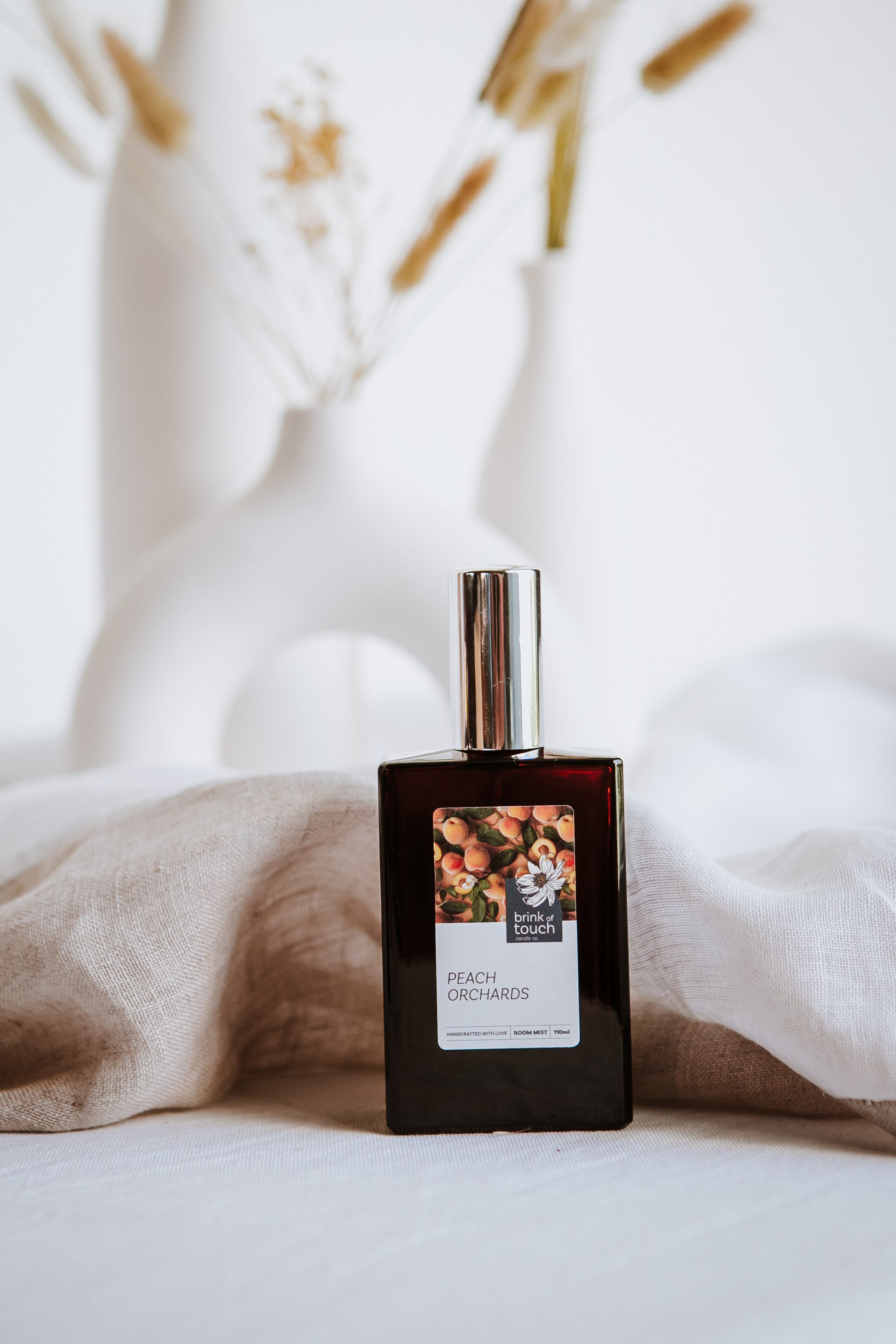 barefoot you walk in a secret fruit orchard. the scents compete for your approval. almost visible they dance around and into your nostrils. tangerine, lemon, white peach…